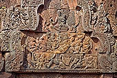 Banteay Srei temple - Shiva on Mount Kailasa (southern library east pediment) Uma sits on his lap. The ten-headed demon Ravana is shaking the mountain